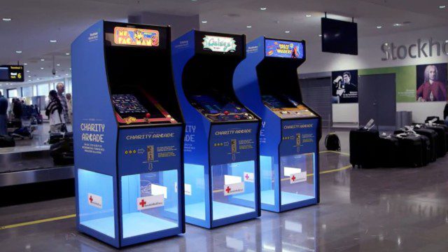 Play Pac-Man for charity while waiting for your bags