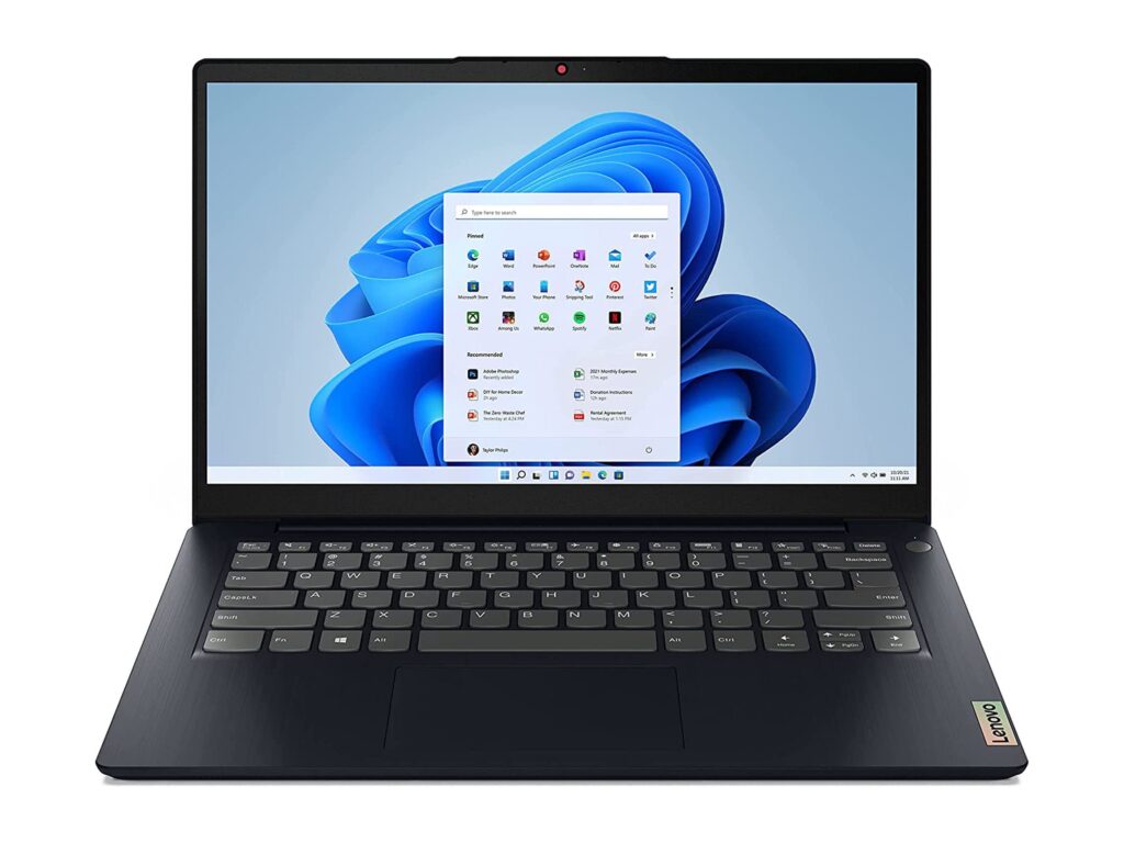 A Lenovo laptop displaying Windows 11 interface with a taskbar and application icons on the screen, positioned frontally.